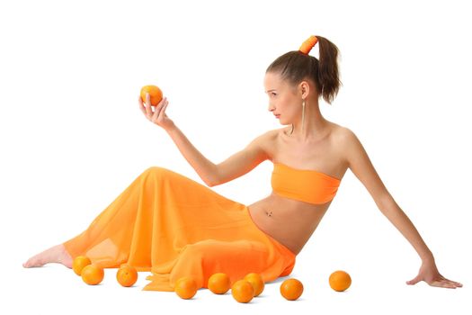 The girl in an orange dress with oranges