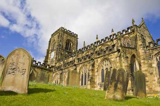 The sandstone coloured church at Thirsk on a sunny Spring day