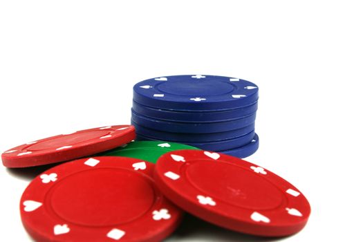 stacks of poker chips isolated overwhite