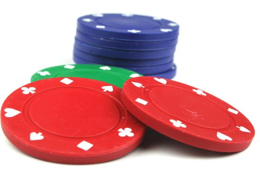 stacks of poker chips isolated overwhite