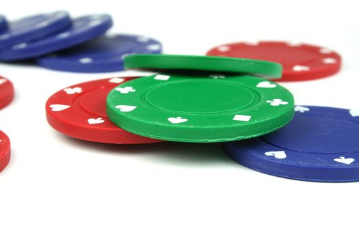 stacks of poker chips isolated overwhite