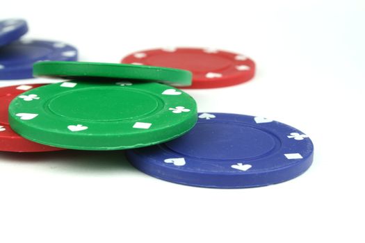 stacks of poker chips isolated overwhite