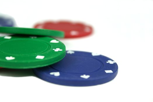 stacks of poker chips isolated overwhite