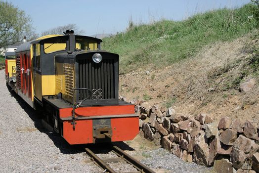 narrow gauge passenger train for carrying tourists along a scenic route