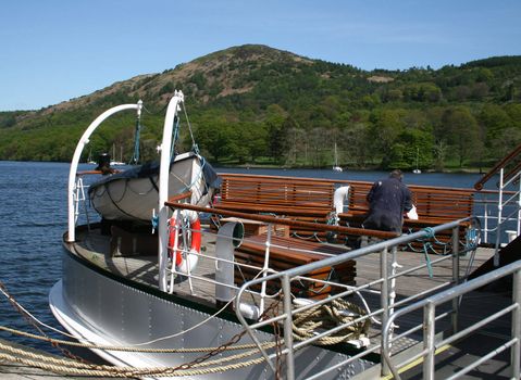 repairs being made on a tourist lake cruiser 