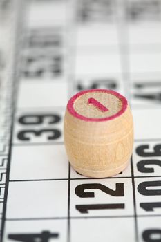 Domino bone of number one on the lotto card
