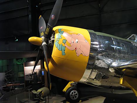 A photograph of nose art on a World War II era airplane.