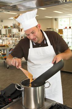 Italian chef working in the restaurant kitchen