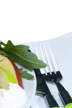fresh salad with knife and fork