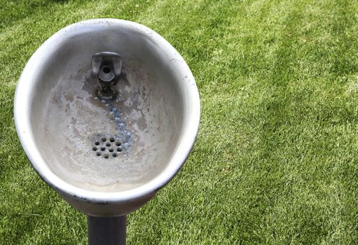 Corroded and weathered drinking fountain