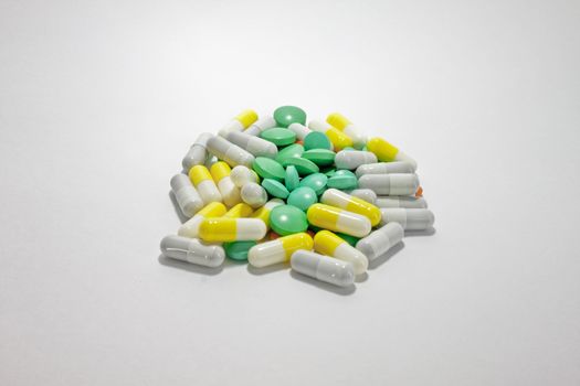 Medicines and tablets on a light background