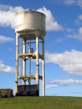 Old Concrete water tower on a hill