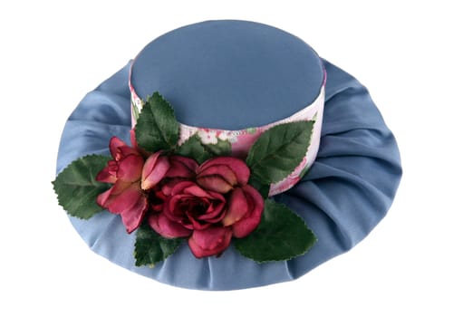Fancy hat with roses isolated on white background
