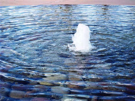 Circular waves emminate from a park fountain - Arizona 