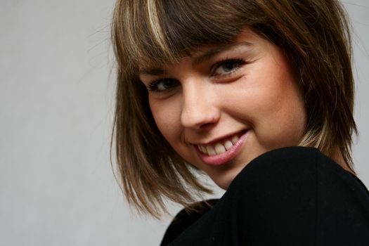 Young beautiful girl in white background