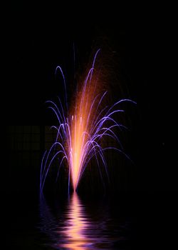 Wonderful spouting fireworks display shooting off from the water