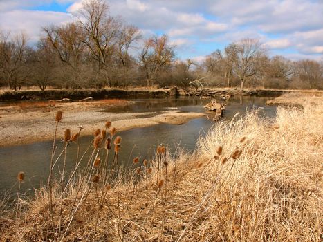 The Kishwaukee River winds through northern Illinois on a sunny autumn day.
