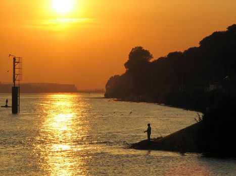 Fishing at sunset 