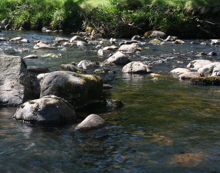 large rocks and boulders in the river