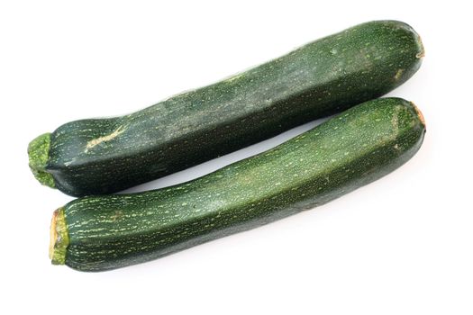 two courgettes isolated over a white background