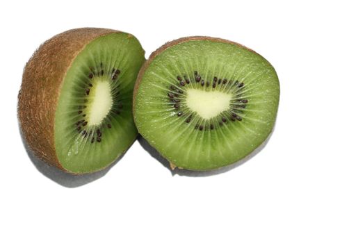 kiwi fruit cut in half showing the seeds and juice of the fruit