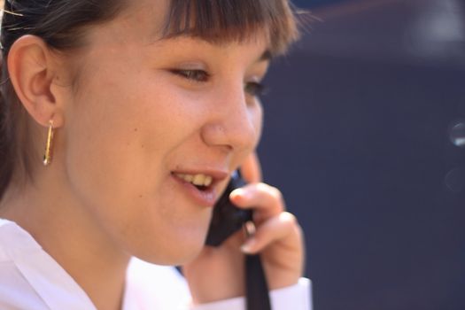 young woman making a call on a mobile phone