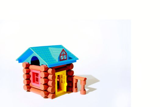 A log cabin toy, on white background