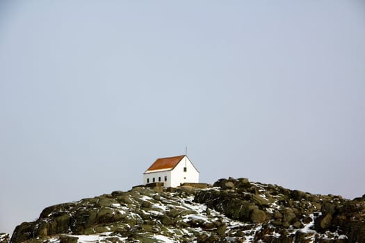 Landscape with a single house on the top of mountain in Serra da Estrela � mountain range in Portugal (Mountain Range of the Star)