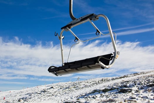 A view from aerial tramway with rocks and snow in Serra da Estrela � mountain range in Portugal (Mountain Range of the Star)