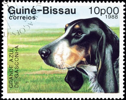 GUINEA-BISSAU - circa 1988:postage stamp features a Grande Azul de Gasconha dog, circa 1988 in the Republic of Guinea-Bissau.