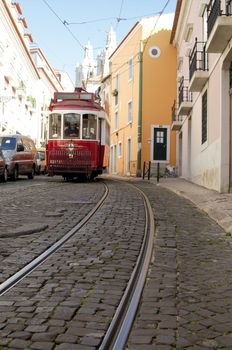 Traditional tram at Lisbon's old quarter of Alfama