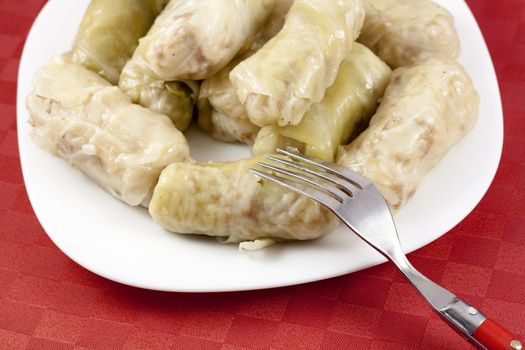 Cabbage rolls (sarma) stuffed with rice and meat.