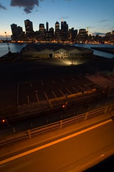 lower manhattan at night, photo taken from brooklyn, 