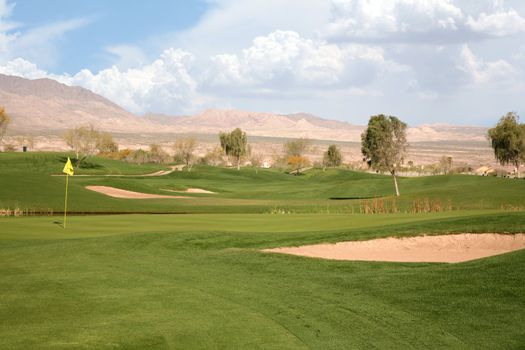 Golf course in the middle of the desert landscape