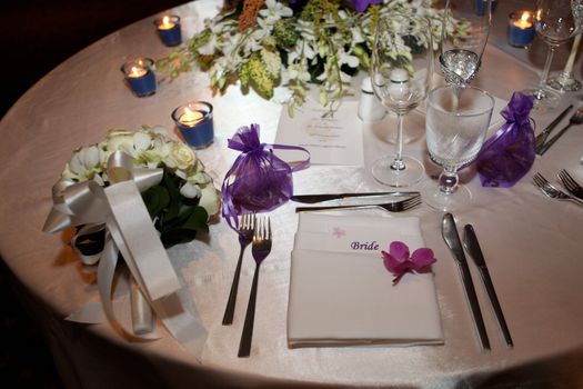 Tables decorated for a wedding reception.