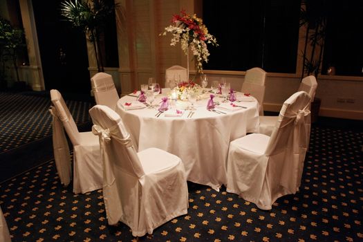 Tables decorated for a wedding reception.