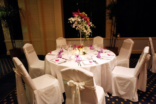 Tables decorated for a wedding reception.