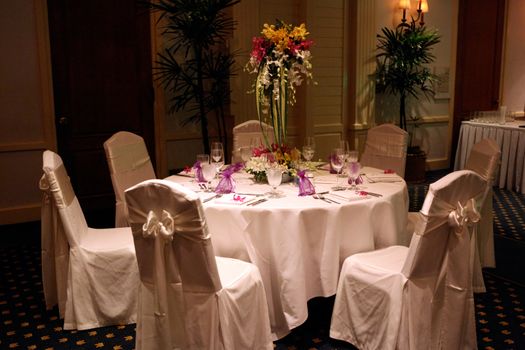 Tables decorated for a wedding reception.