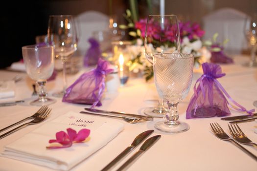 Tables decorated for a wedding reception.