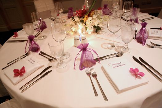 Tables decorated for a wedding reception.