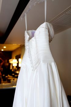 Beautiful white silk and satin wedding dress.