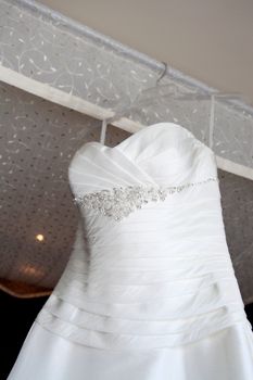 Beautiful white silk and satin wedding dress.