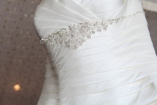 Beautiful white silk and satin wedding dress.