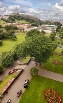 The gardens alongside Princes Street in Edinburgh, Scotland, with the National Gallery beyond and the castle on the skyline.