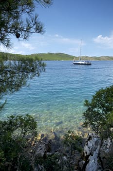 Anchored yacht in clear waters of the Mediterranean Sea