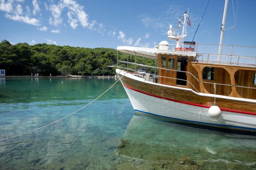 Anchored ship in clear waters of the Mediterranean Sea