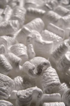 several white styrofoam packing peanuts close up shot