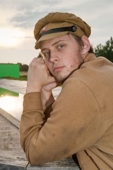 Portrait of soldier in uniform of World War 1 Costume accord the times of World War I. Photo made at cinema city Cinevilla in Latvia. Cockade on the hat do not contain trade mark.