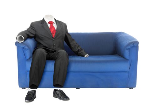 Ghost of the man in classic suit is sitting on a blue couch. Isolated over white