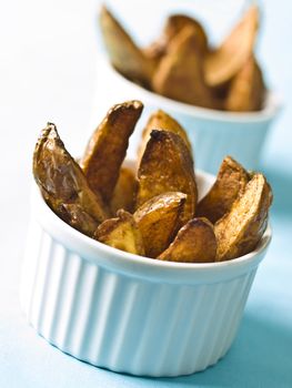 close up of bowls of potato wedges